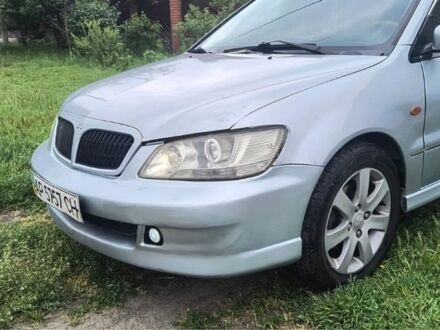 Серый Мицубиси Лансер, объемом двигателя 1.6 л и пробегом 290 тыс. км за 3500 $, фото 1 на Automoto.ua