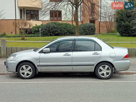 Сірий Міцубісі Lancer, об'ємом двигуна 1.6 л та пробігом 160 тис. км за 4200 $, фото 1 на Automoto.ua