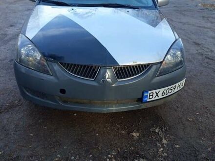 Міцубісі Lancer 2004 у Хмельницькому на Automoto.ua Сірий Міцубісі Lancer, об'ємом двигуна 2 л та пробігом 280 тис. км за 2200 $, фото 1 на Automoto.ua