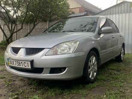 Міцубісі Lancer 2004 у Харкові на Automoto.ua Сірий Міцубісі Lancer, об'ємом двигуна 1.6 л та пробігом 27 тис. км за 4800 $, фото 1 на Automoto.ua