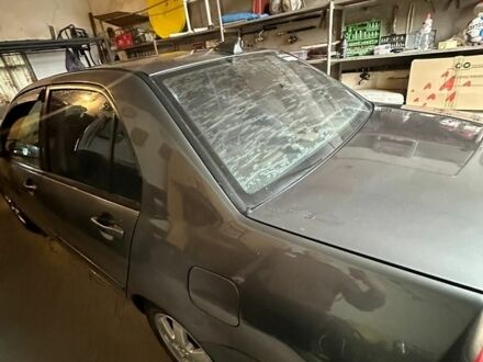 Сірий Міцубісі Lancer, об'ємом двигуна 1.6 л та пробігом 285 тис. км за 4200 $, фото 1 на Automoto.ua