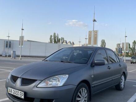 Міцубісі Lancer 2004 у Києві на Automoto.ua Сірий Міцубісі Lancer, об'ємом двигуна 1.6 л та пробігом 360 тис. км за 3750 $, фото 1 на Automoto.ua