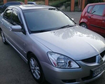 Сірий Міцубісі Lancer, об'ємом двигуна 2 л та пробігом 304 тис. км за 5000 $, фото 1 на Automoto.ua