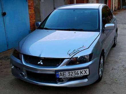 Міцубісі Lancer 2004 у Никополе на Automoto.ua Сірий Міцубісі Lancer, об'ємом двигуна 2 л та пробігом 204 тис. км за 5200 $, фото 1 на Automoto.ua