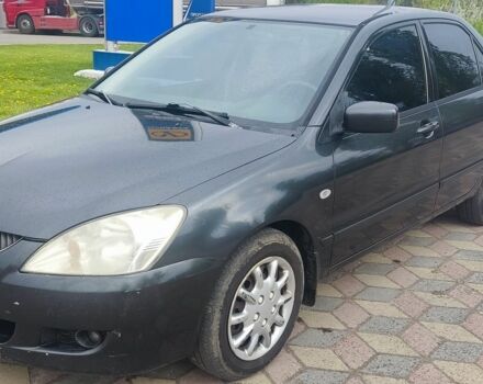 Сірий Міцубісі Lancer, об'ємом двигуна 1.6 л та пробігом 211 тис. км за 3500 $, фото 1 на Automoto.ua