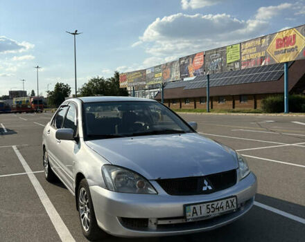 Сірий Міцубісі Lancer, об'ємом двигуна 1.58 л та пробігом 351 тис. км за 2500 $, фото 1 на Automoto.ua