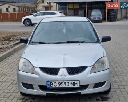 Сірий Міцубісі Lancer, об'ємом двигуна 1.58 л та пробігом 360 тис. км за 2850 $, фото 1 на Automoto.ua