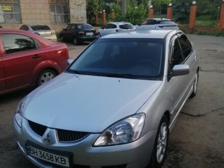 Міцубісі Lancer 2004 у Одесі на Automoto.ua Сірий Міцубісі Lancer, об'ємом двигуна 2 л та пробігом 304 тис. км за 5000 $, фото 1 на Automoto.ua
