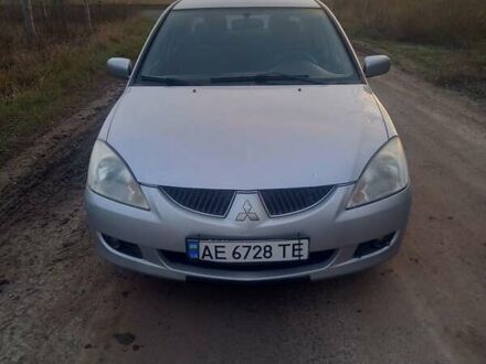 Сірий Міцубісі Lancer, об'ємом двигуна 1.6 л та пробігом 280 тис. км за 3800 $, фото 1 на Automoto.ua