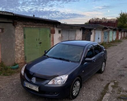 Сірий Міцубісі Lancer, об'ємом двигуна 1.6 л та пробігом 307 тис. км за 3700 $, фото 1 на Automoto.ua
