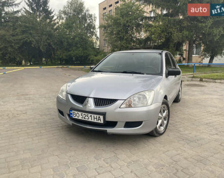 Сірий Міцубісі Lancer, об'ємом двигуна 1.58 л та пробігом 268 тис. км за 3799 $, фото 1 на Automoto.ua