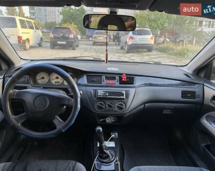 Сірий Міцубісі Lancer, об'ємом двигуна 1.58 л та пробігом 176 тис. км за 3200 $, фото 1 на Automoto.ua