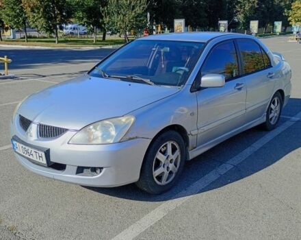 Сірий Міцубісі Lancer, об'ємом двигуна 1.6 л та пробігом 301 тис. км за 3000 $, фото 1 на Automoto.ua