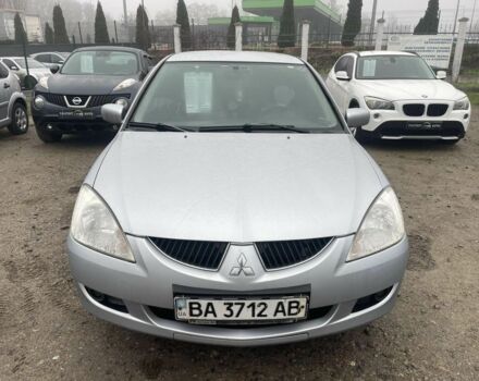 Серый Мицубиси Лансер, объемом двигателя 1.6 л и пробегом 200 тыс. км за 3906 $, фото 1 на Automoto.ua