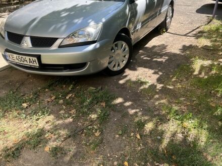 Сірий Міцубісі Lancer, об'ємом двигуна 1.6 л та пробігом 107 тис. км за 4600 $, фото 1 на Automoto.ua