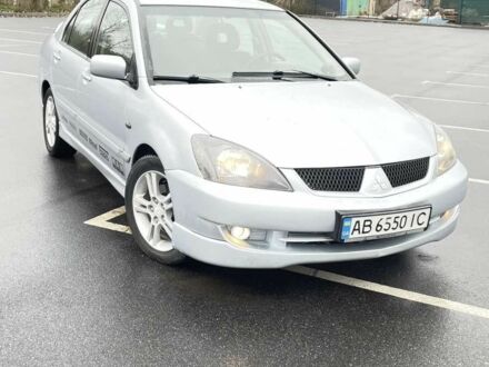 Сірий Міцубісі Lancer, об'ємом двигуна 2 л та пробігом 1 тис. км за 3500 $, фото 1 на Automoto.ua