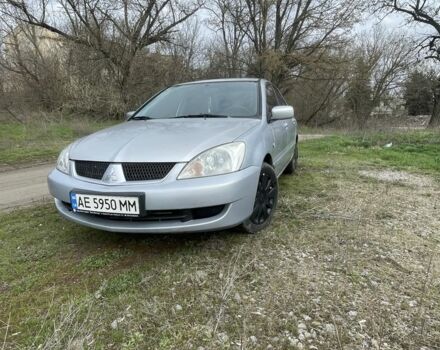 Серый Мицубиси Лансер, объемом двигателя 1.6 л и пробегом 289 тыс. км за 3450 $, фото 1 на Automoto.ua