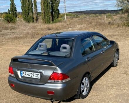 Сірий Міцубісі Lancer, об'ємом двигуна 1.6 л та пробігом 264 тис. км за 5000 $, фото 1 на Automoto.ua