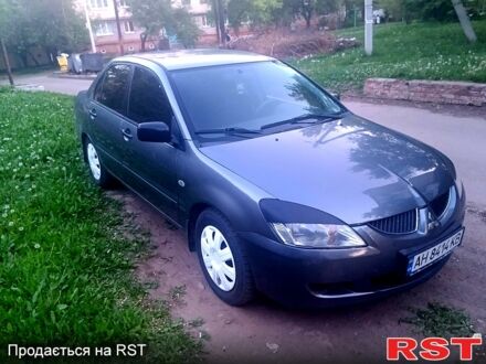 Сірий Міцубісі Lancer, об'ємом двигуна 1.6 л та пробігом 250 тис. км за 3700 $, фото 1 на Automoto.ua