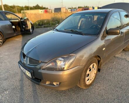 Сірий Міцубісі Lancer, об'ємом двигуна 1.6 л та пробігом 426 тис. км за 3000 $, фото 1 на Automoto.ua