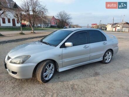 Мицубиси Лансер 2005 в Каменце-Подольском на Automoto.ua Серый Мицубиси Лансер, объемом двигателя 2 л и пробегом 249 тыс. км за 4100 $, фото 1 на Automoto.ua