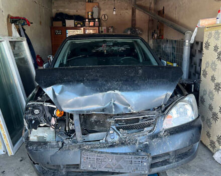 Сірий Міцубісі Lancer, об'ємом двигуна 1.58 л та пробігом 299 тис. км за 2299 $, фото 1 на Automoto.ua