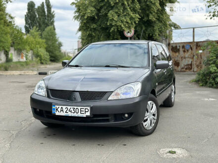 Сірий Міцубісі Lancer, об'ємом двигуна 1.6 л та пробігом 240 тис. км за 4600 $, фото 1 на Automoto.ua