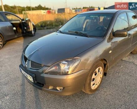 Сірий Міцубісі Lancer, об'ємом двигуна 1.58 л та пробігом 426 тис. км за 3000 $, фото 1 на Automoto.ua