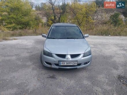 Мицубиси Лансер 2005 в Изюме на Automoto.ua Серый Мицубиси Лансер, объемом двигателя 1.6 л и пробегом 244 тыс. км за 3300 $, фото 1 на Automoto.ua
