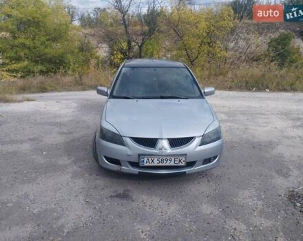 Сірий Міцубісі Lancer, об'ємом двигуна 1.6 л та пробігом 244 тис. км за 3300 $, фото 1 на Automoto.ua
