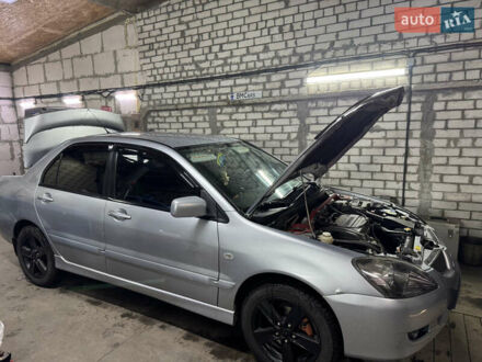 Міцубісі Lancer 2005 у Дніпро (Дніпропетровську) на Automoto.ua Сірий Міцубісі Lancer, об'ємом двигуна 2 л та пробігом 178 тис. км за 4500 $, фото 1 на Automoto.ua