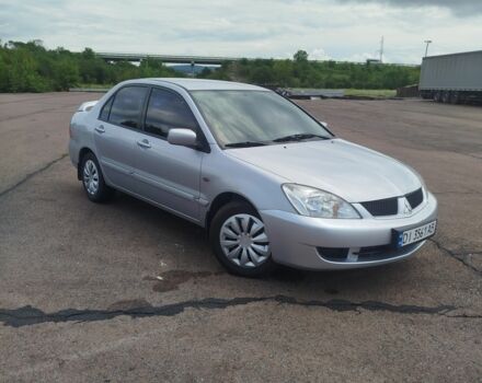 Сірий Міцубісі Lancer, об'ємом двигуна 1.6 л та пробігом 250 тис. км за 4000 $, фото 1 на Automoto.ua