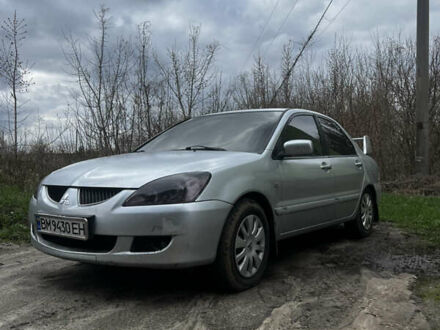 Мицубиси Лансер 2005 в Тростянец на Automoto.ua Серый Мицубиси Лансер, объемом двигателя 1.6 л и пробегом 260 тыс. км за 2700 $, фото 1 на Automoto.ua