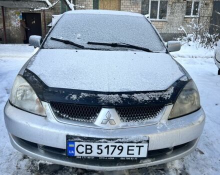 Сірий Міцубісі Lancer, об'ємом двигуна 1.6 л та пробігом 1 тис. км за 2500 $, фото 1 на Automoto.ua