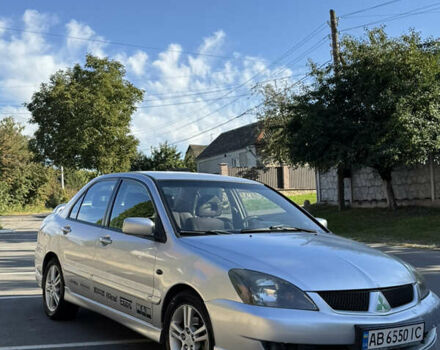 Сірий Міцубісі Lancer, об'ємом двигуна 2 л та пробігом 346 тис. км за 3200 $, фото 1 на Automoto.ua
