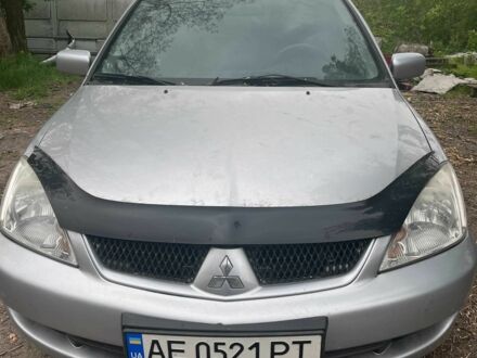 Сірий Міцубісі Lancer, об'ємом двигуна 1.6 л та пробігом 290 тис. км за 3713 $, фото 1 на Automoto.ua