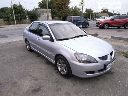 Мицубиси Лансер 2005 в Подольск (Котовск) на Automoto.ua Серый Мицубиси Лансер, объемом двигателя 2 л и пробегом 210 тыс. км за 3999 $, фото 1 на Automoto.ua