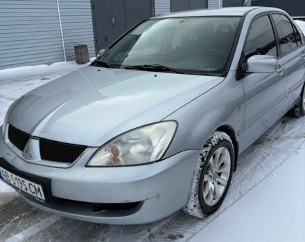 Серый Мицубиси Лансер, объемом двигателя 1.6 л и пробегом 2 тыс. км за 2700 $, фото 1 на Automoto.ua