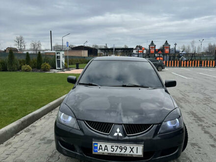 Серый Мицубиси Лансер, объемом двигателя 1.58 л и пробегом 300 тыс. км за 3500 $, фото 1 на Automoto.ua