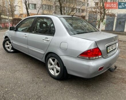 Серый Мицубиси Лансер, объемом двигателя 1.58 л и пробегом 281 тыс. км за 3250 $, фото 1 на Automoto.ua