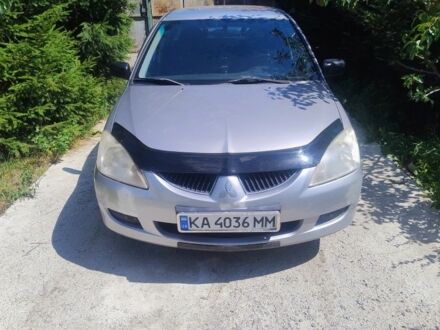 Міцубісі Lancer 2005 у Києві на Automoto.ua Сірий Міцубісі Lancer, об'ємом двигуна 1.6 л та пробігом 314 тис. км за 4100 $, фото 1 на Automoto.ua