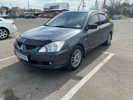 Сірий Міцубісі Lancer, об'ємом двигуна 0.16 л та пробігом 200 тис. км за 4950 $, фото 1 на Automoto.ua