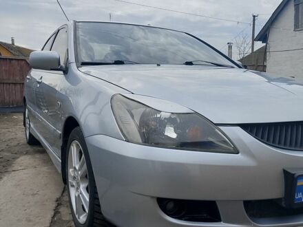 Мицубиси Лансер 2005 в Прилуках на Automoto.ua Серый Мицубиси Лансер, объемом двигателя 2 л и пробегом 208 тыс. км за 4000 $, фото 1 на Automoto.ua