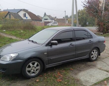 Сірий Міцубісі Lancer, об'ємом двигуна 1.6 л та пробігом 213 тис. км за 4205 $, фото 1 на Automoto.ua