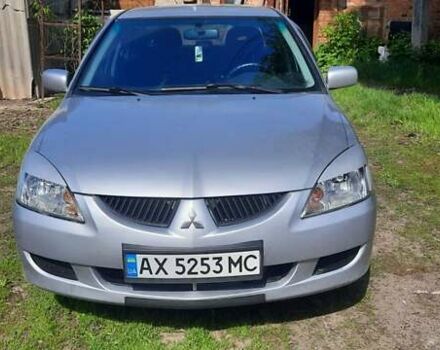 Сірий Міцубісі Lancer, об'ємом двигуна 1.58 л та пробігом 250 тис. км за 5000 $, фото 1 на Automoto.ua