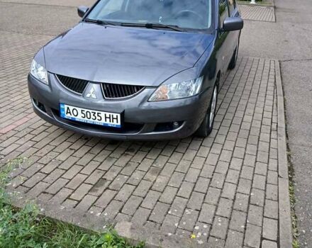 Сірий Міцубісі Lancer, об'ємом двигуна 1.58 л та пробігом 200 тис. км за 4500 $, фото 1 на Automoto.ua