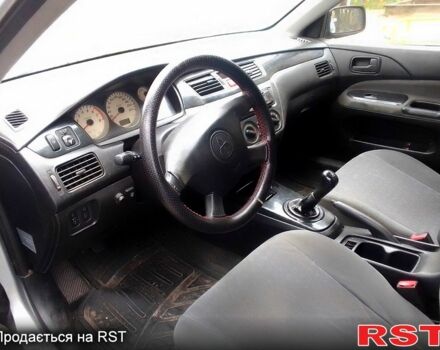 Сірий Міцубісі Lancer, об'ємом двигуна 1.6 л та пробігом 360 тис. км за 1999 $, фото 1 на Automoto.ua