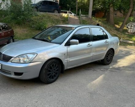 Сірий Міцубісі Lancer, об'ємом двигуна 1.6 л та пробігом 260 тис. км за 2200 $, фото 1 на Automoto.ua