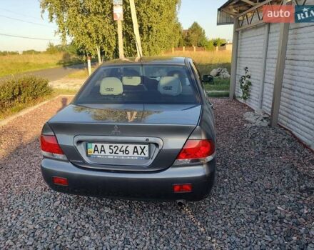 Сірий Міцубісі Lancer, об'ємом двигуна 1.58 л та пробігом 285 тис. км за 3200 $, фото 1 на Automoto.ua