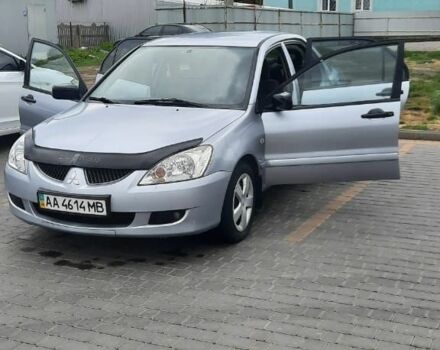 Серый Мицубиси Лансер, объемом двигателя 1.6 л и пробегом 277 тыс. км за 3500 $, фото 1 на Automoto.ua